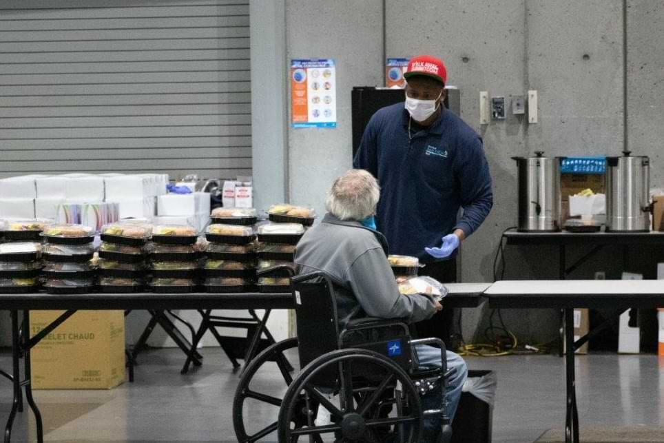 Shelter resident receives a Centerplate meal