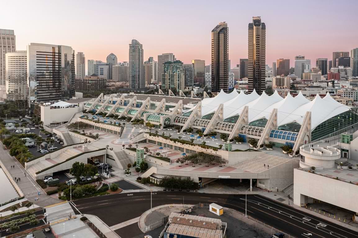 San Diego Convention Center at sunset with the San Diego skylight behind